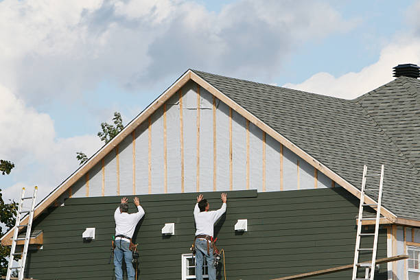 Professional Siding Contractor technician working in Imler, PA